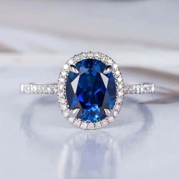 Aprilslplace Jewelry - Blue Oval Halo Ring Woman